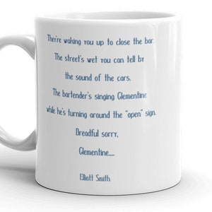 Mug: &quot;They’re waking you up to close the bar. The street’s wet you can tell by the sound of the cars. The bartender’s singing Clementine whi