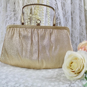 Cartera de mano vintage Ande de los años 60 en metal dorado, cartera de noche metálica, asa retorcida de metal dorado, cierre dorado, un bolsillo, forro interior