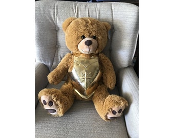 Mini Brass Vegas Golden Knights Breastplate, on a teddy bear, NOT A CHILD'S TOY.  Made by same designer as Full sized one worn on the ice.