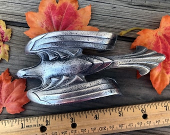 Polished Cast aluminum 1932 Chevy Eagle hood ornament, 6" long, 2 1/2" wide.