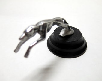 Very Small Greyhound Hood Ornament, cast aluminum, with bolt on back.  4.25" long. Black stand not included.