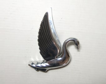 Full size cast Aluminum Packard swan Hood Ornament, with bolt on bottom.  6.75" tail to beak, wooden stand not included.