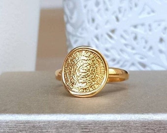 Curved Phaistos Ring
