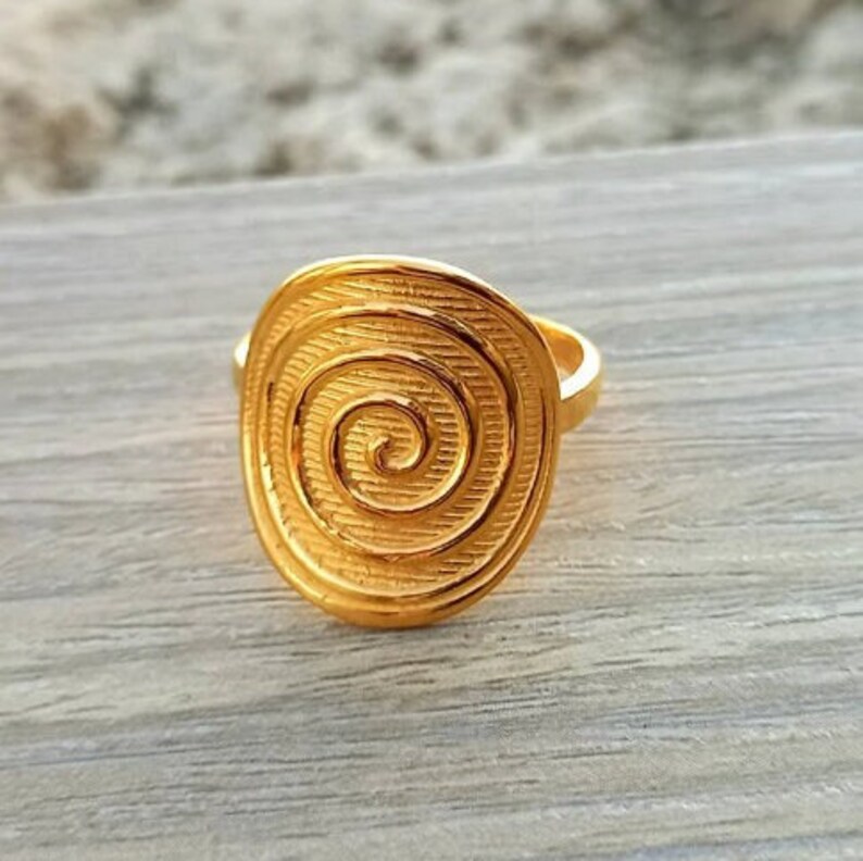 Dainty 14k gold filled  Ring with an eye-catching Spiral coin disc.