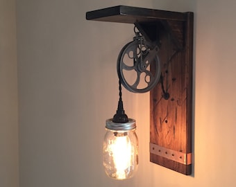 Rustic Steampunk wall light, mason jar, pulley, and Edison bulb with a shelf.  Farmhouse or steampunk-style