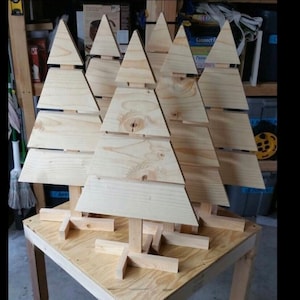 Building plans for cute mini Christmas trees made from a 1x6 board. Cut list and instructions.  Great gift for a woodworker!