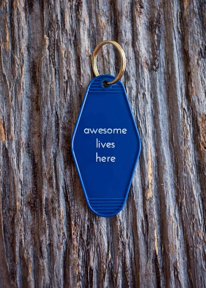 Awesome Lives Here Motel Keytag