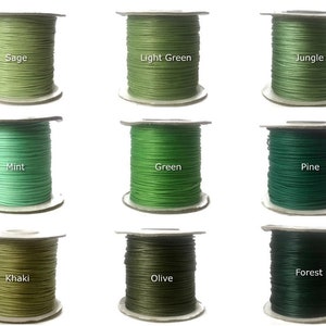 May include: Nine spools of waxed cotton cord in various shades of green, including Sage, Light Green, Jungle, Mint, Green, Pine, Khaki, Olive, and Forest.
