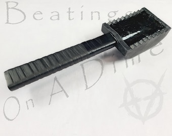 The Rubber Block Paddle: The Ultimate Thuddy Butt Bruiser