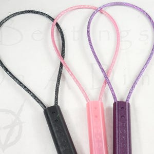 Batedor de Cabo Brilhante: Brinquedo de Aço para Palmadas OTK