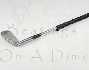 Paleta de golf Heavy Metal para un juego de impacto intenso.