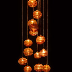 Exotic Multi-Color Blown Glass Pendant Lighting - Farmhouse and Modern Foyer Lighting. Handcrafted with colored blown glass. Unique fixtures