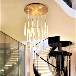 Modern Ferraro Chandelier on round canopy. High Ceiling Design Idea