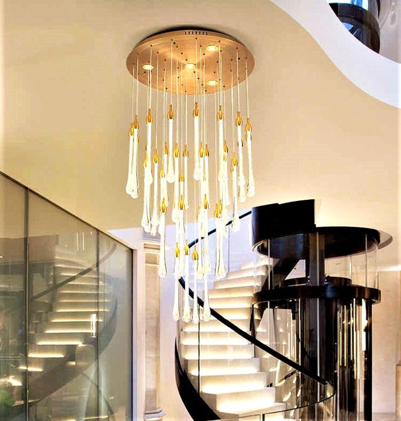 Modern Ferraro Chandelier on round canopy. High Ceiling Design Idea