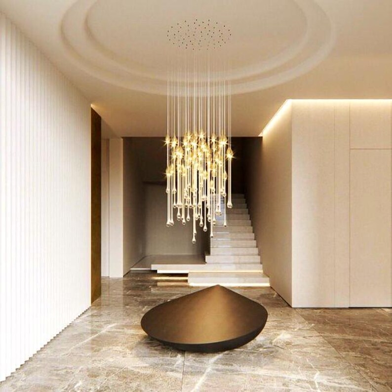 Modern Ferraro Chandelier in living room on White round canopy. High Ceiling Design Idea