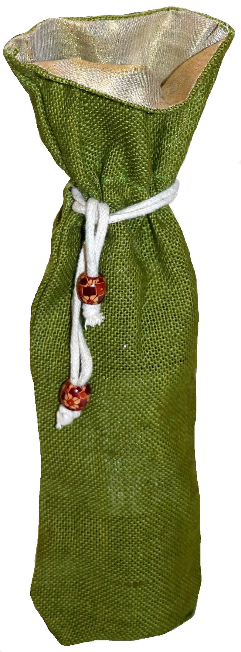 May include: A green burlap wine bottle bag with a white drawstring and wooden beads. The bag has a gold lining.