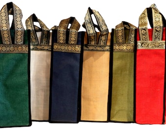 De magnifiques sacs à vin ! Des sacs à vin en brocart ! Sacs à vin en jute exclusifs ! Des sacs pour une seule bouteille ! Sacs cadeaux vin design ! Idéal pour offrir du champagne !