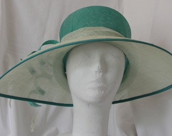 Handblocked and sewn sinamay hat with large tear shaped brim, in contrasting Jade and surf colours.