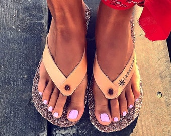 Unique flip flops with pebbles that massage your feet!