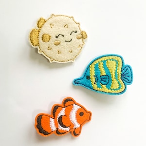 Pinzas para el cabello con diseño de peces tropicales