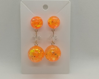 Boucles d'oreilles sphères pendantes orange