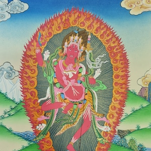May include: A colorful painting of a deity with multiple arms and legs, standing on a lotus base. The deity is surrounded by flames and has a fierce expression. The painting is done in a traditional Tibetan style.