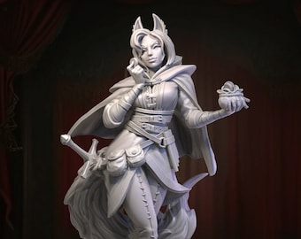 May include: A gray painted miniature figurine of a female fox person wearing a hooded cloak, holding a small pouch in one hand and a sword in the other. The figurine is standing on a stage with red curtains in the background. The text "Great Grimoire" is visible in the lower right corner of the image.