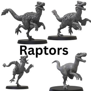 May include: Four grey plastic figurines of velociraptors, each standing on a black base. The word "Raptors" is printed in black letters below the figurines.