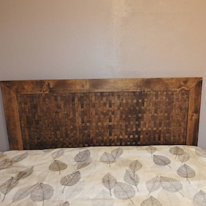 BODEGA wood headboard,weave pattern created with wood strips.Height is 31" and displayed in provincial stain.(Free shipping*)