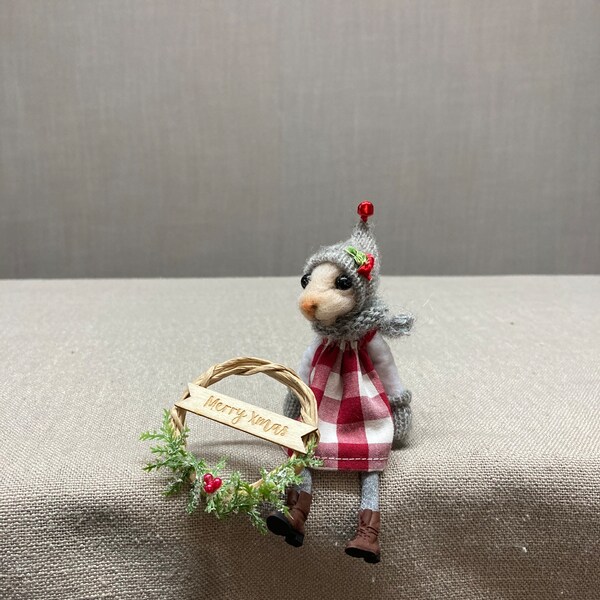 Needle felted mouse with Christmas wreath.