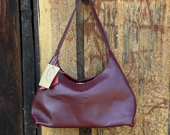 Minimalist Burgundy Leather Shoulder Bag with Natural Marks — Bruno Balandis The Drop "Scar"