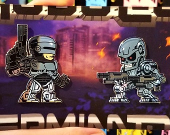 MOVIEPINS - ROBO v TERM Hard Enamel Pins