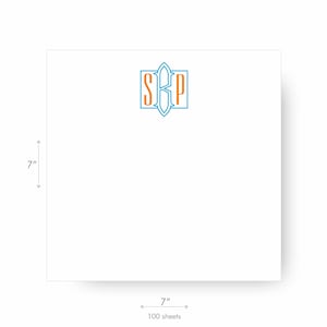 May include: A pack of 100 white notepads with a blue and orange monogram of the letters "SRP" in a decorative font. The notepads are 7 inches by 7 inches.