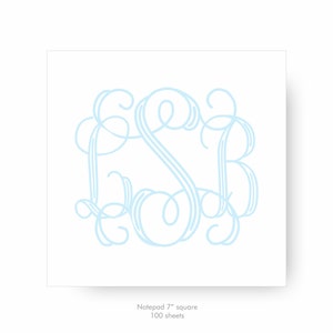 May include: A light blue notepad with a monogram of the letters "ESR" in a decorative script font. The notepad is 7 inches square and has 100 sheets.