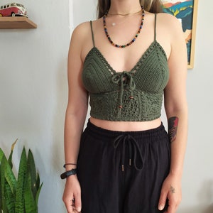 • Handmade granny square halter top styled with black pants