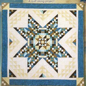 May include: A quilt pattern cover titled Lace Star by Cozy Quilt Designs. The quilt features a large central star in shades of blue, gold, and brown, surrounded by a blue border. The text reads Lace Star, A quilt along project, and Finishes about 88" x 88".
