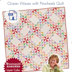 May include: A quilt pattern for a quilt with a white background and colorful pinwheel designs. The quilt is called "Ocean Waves with Pinwheels Quilt" and is a "Quilt in a Day" pattern. The pattern is by Eleanor Burns and requires an AccuQuilt die cutter. The pattern is layer cake friendly.