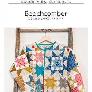 May include: A quilted jacket pattern called "Beachcomber" with a colorful patchwork design featuring stars, squares, and polka dots. The jacket is hanging on a wooden ladder.