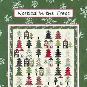 May include: A quilt pattern featuring a winter scene with houses and trees. The pattern is called "Nestled in the Trees" and is by Coach House Designs.