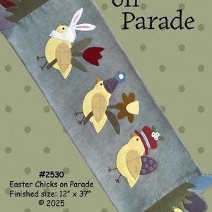 May include: A felt applique pattern for an Easter table runner featuring three chicks wearing hats and holding flowers. The pattern is titled "Easter Chicks on Parade" and is 12 inches by 37 inches. The pattern is from the company "All Through the Night" and is made in the USA.