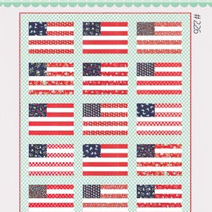 May include: A quilt pattern featuring 16 American flags in a grid layout. The flags are made up of red, white, and blue fabric with a variety of patterns. The title "Stars and Stripes" is printed below the quilt pattern. The pattern number is #226.
