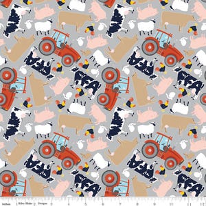 May include: A gray and white fabric with a repeating pattern of red tractors, cows, pigs, and chickens. The fabric has a white background with a gray border.
