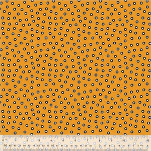 May include: A yellow fabric with a repeating pattern of small black circles with white centers.