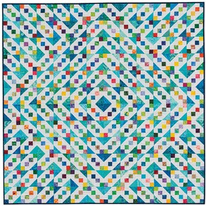 May include: A colourful quilt with a geometric pattern of squares and triangles. The quilt is made with a variety of fabrics in shades of blue, green, yellow, and white.
