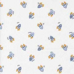 May include: White fabric with a repeating pattern of yellow flowers and blue heart-shaped vases. The flowers have a detailed design, and the vases have a stitched appearance. The overall design is a floral pattern.