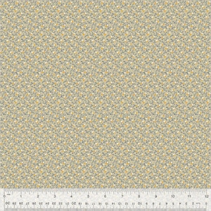 May include: A fabric with a repeating pattern of small yellow and white flowers and dark blue stems on a light beige background. The fabric is measured with a ruler in inches.