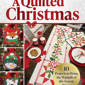 May include: A Quilted Christmas book cover with red text and a festive theme. The image includes a quilted table runner, placemats, and ornaments. The book promises 10 projects to bring warmth to the home.