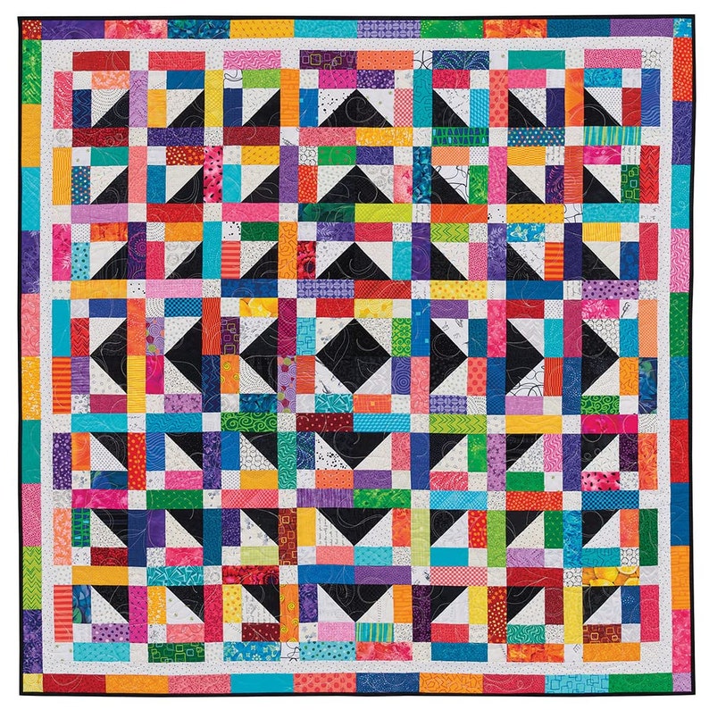 May include: A colourful quilt with a geometric pattern of black, white, and various bright colours. The quilt is made up of squares and triangles, creating a visually interesting design.