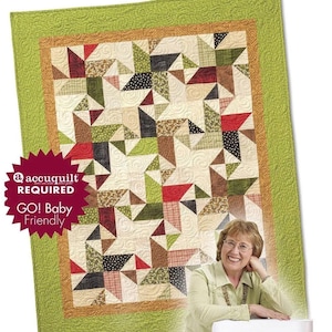 May include: A quilt pattern book with a colorful quilt design on the cover. The book is titled "Quilt in a Day Chisel Quilts" and features the text "@accuquilt REQUIRED GO! Baby Friendly".