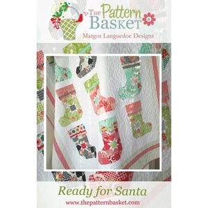 May include: A quilt pattern featuring a white background with colorful patchwork stockings. The title "Ready for Santa" is printed below the quilt. The text "The Pattern Basket" is printed at the top of the image.
